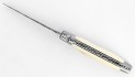 Couteau Laguiole 12 cm double platine, mitres inox brossé en ivoire de phacochère, lame damas carbone.
